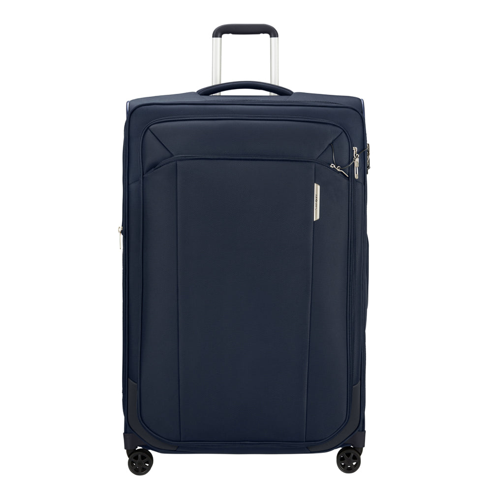 Samsonite Respark 82cm spinner suitcase in midnight blue, featuring smooth wheels and sturdy handle for easy travel.