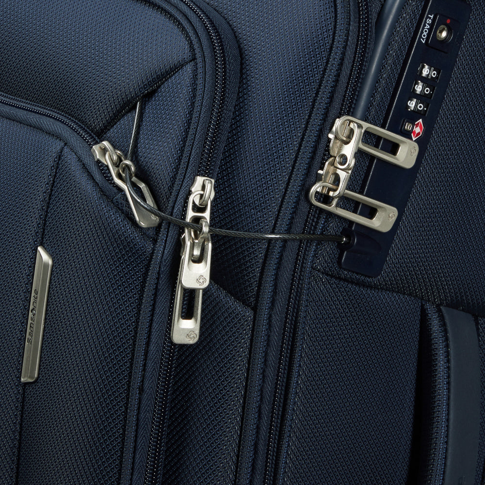 Midnight blue Samsonite 82cm Spinner Suitcase, featuring a sleek design and smooth-rolling wheels for easy travel.