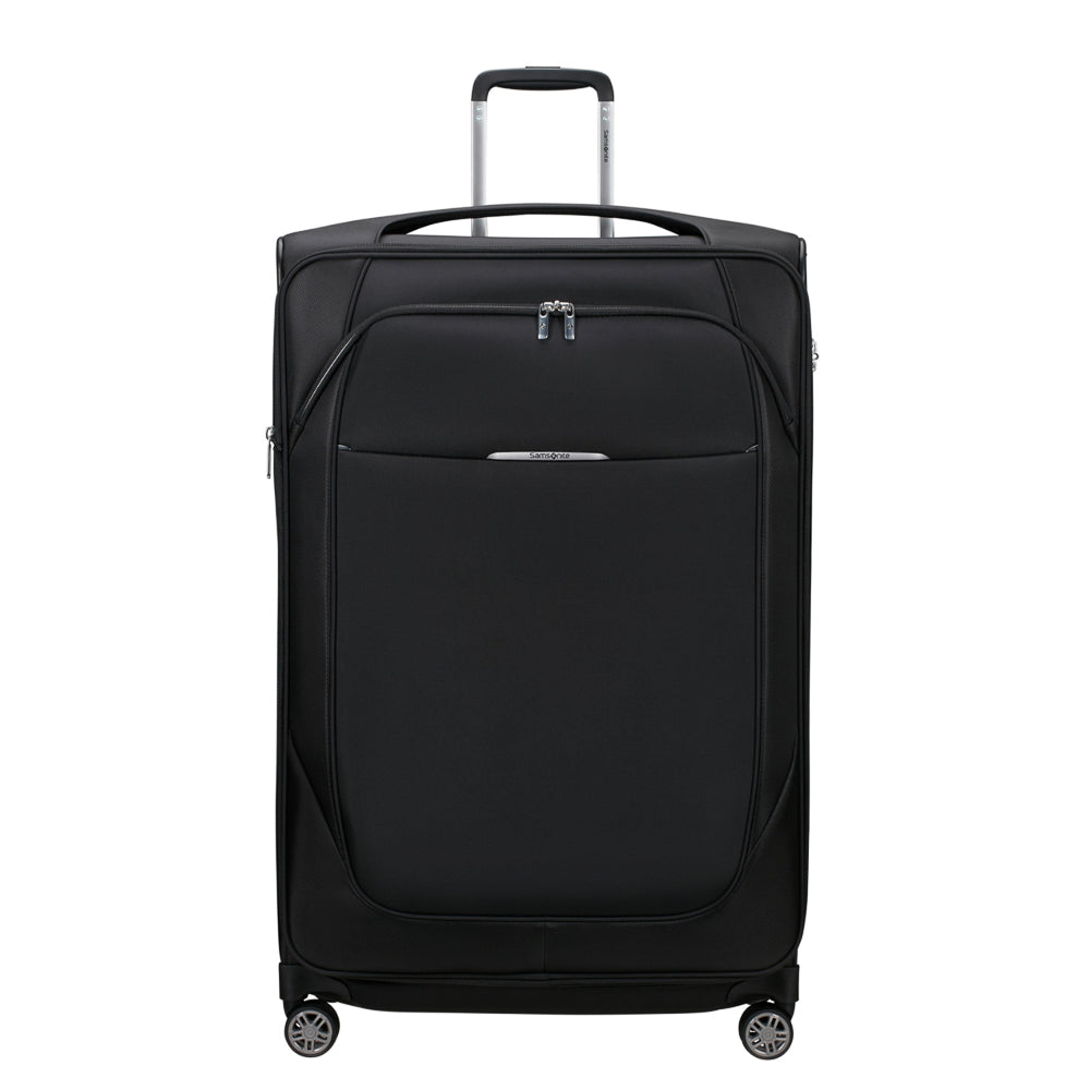 Samsonite Re-Lite 83cm expandable spinner suitcase in black, showcasing durable exterior and smooth-rolling wheels.