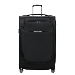 Samsonite Re-Lite 83cm expandable spinner suitcase in black, showcasing durable exterior and smooth-rolling wheels.
