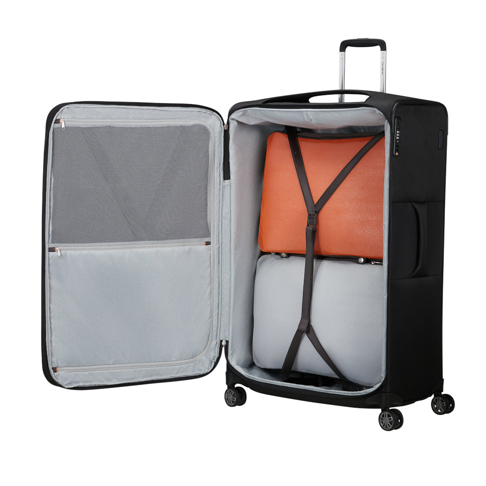Samsonite Re-Lite 83cm expandable spinner suitcase in black, featuring four wheels and a sleek design for easy travel.