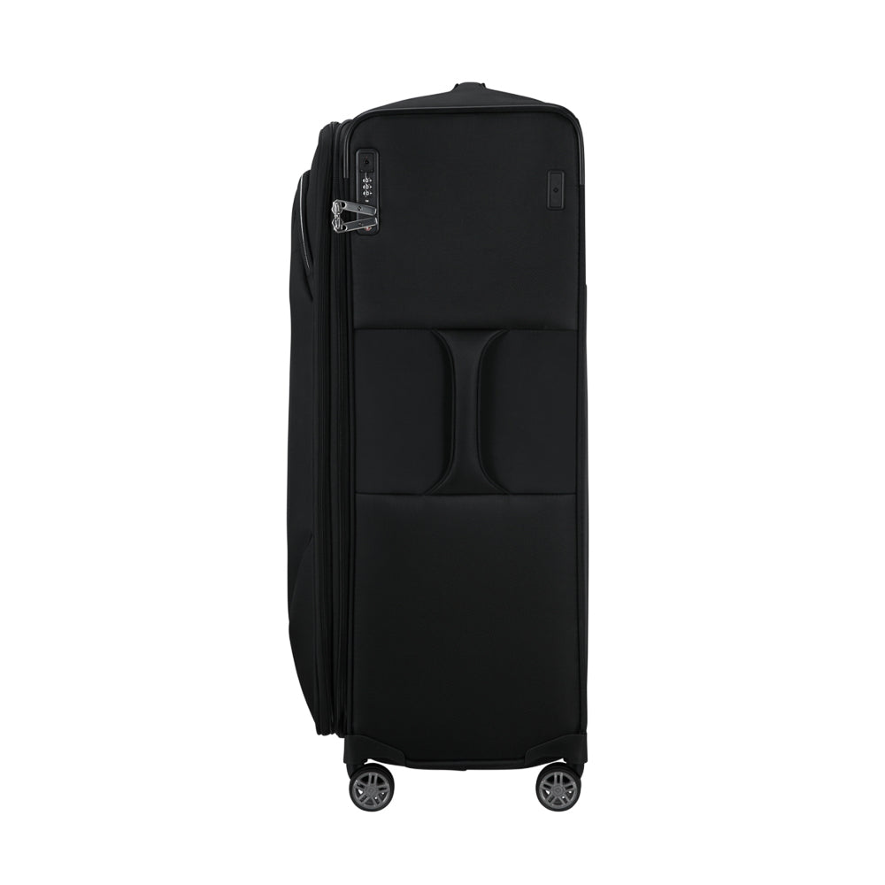 Samsonite Re-Lite 83cm expandable spinner suitcase in black, showcasing wheels and sturdy handles for easy travel.