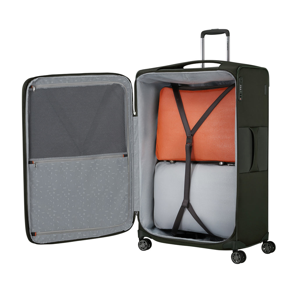 Green 83cm expandable spinner suitcase by Samsonite, showcasing durable exterior and smooth-rolling wheels.