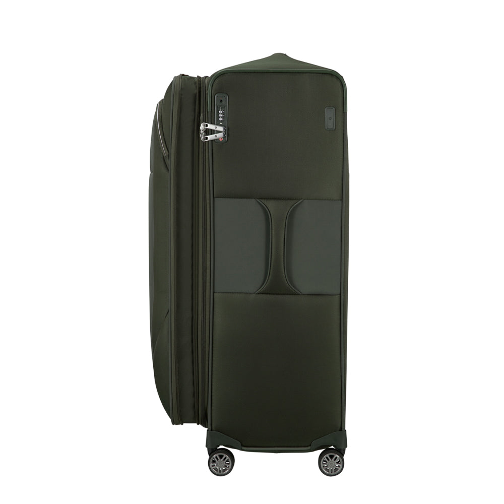 Green 83cm Samsonite Re-Lite expandable spinner suitcase, showcasing sturdy wheels and spacious interior for travel.